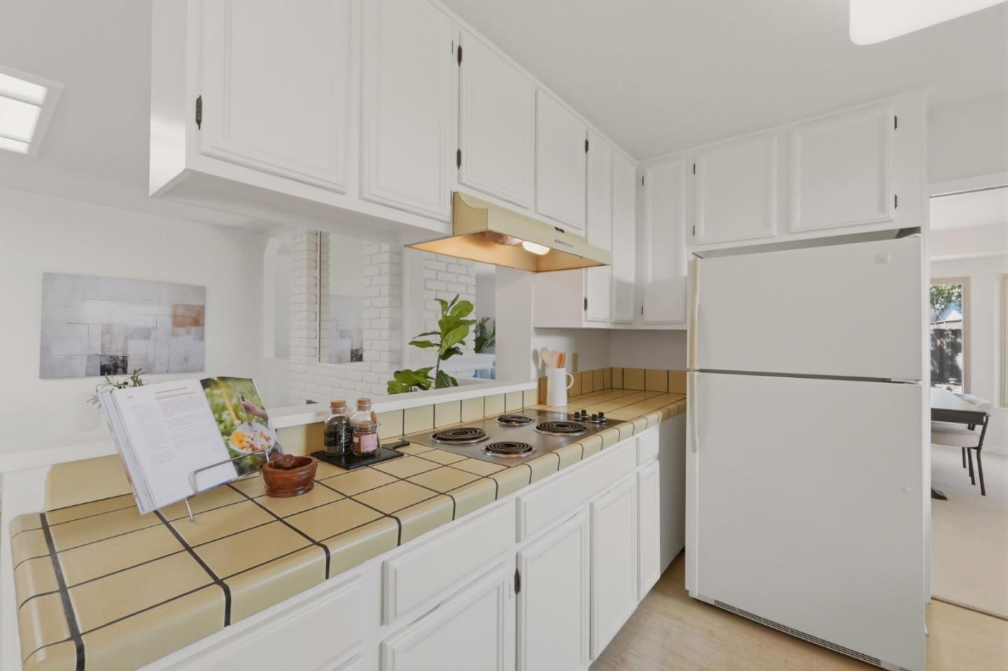 7577 Bollinger Road Cupertino, CA 95014 - Photo 12 of 56 a kitchen with stainless steel appliances a white refrigerator stove a sink and dishwasher