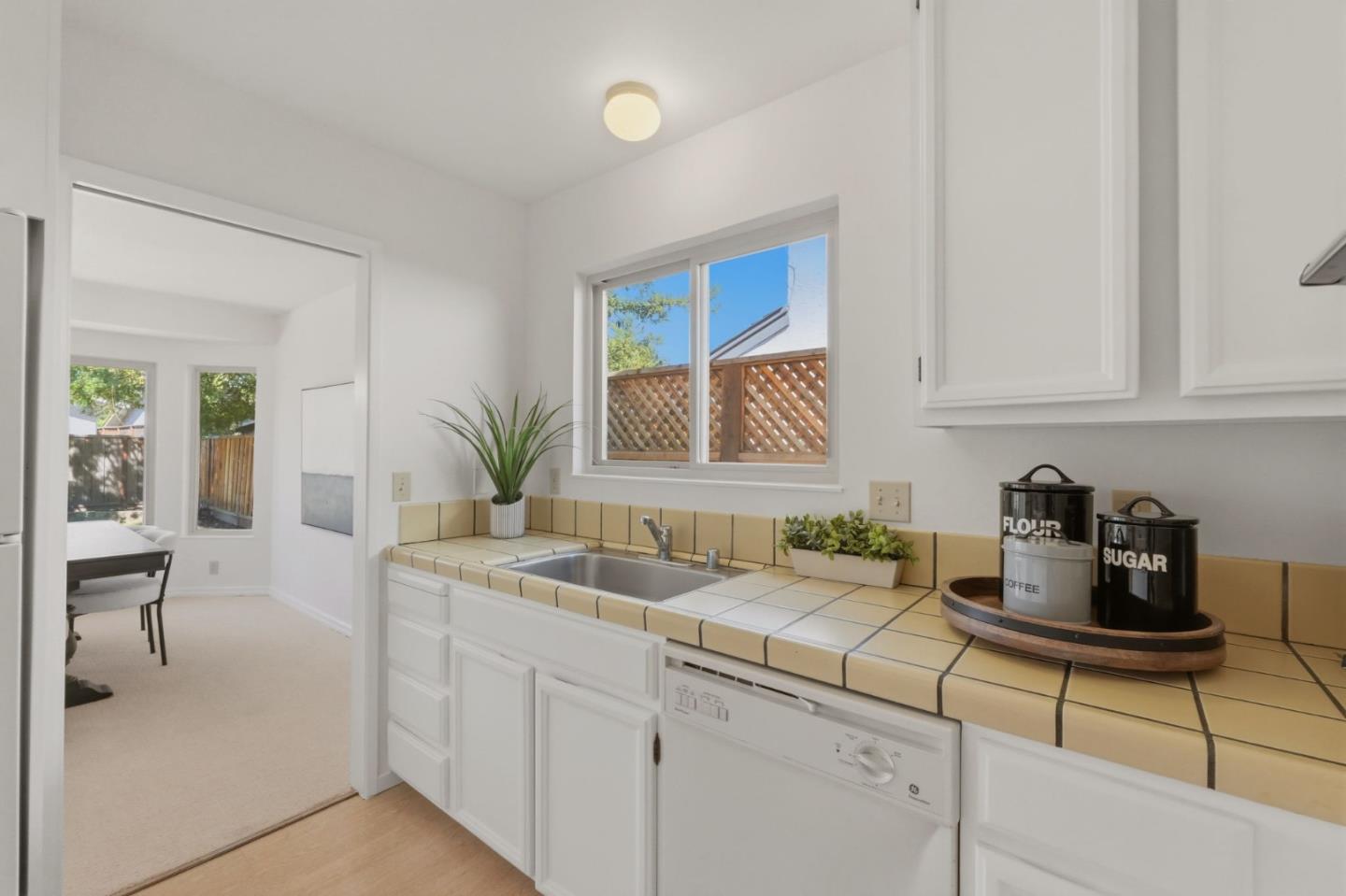 7577 Bollinger Road Cupertino, CA 95014 - Photo 15 of 56 a kitchen with a sink and cabinets