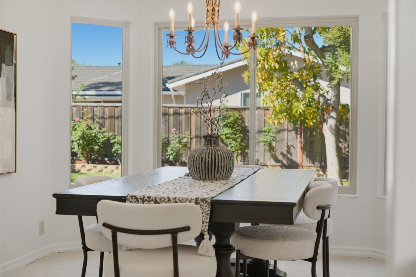 7577 Bollinger Road Cupertino, CA 95014 - Photo 19 of 56 a view of a dining room with furniture window and wooden floor