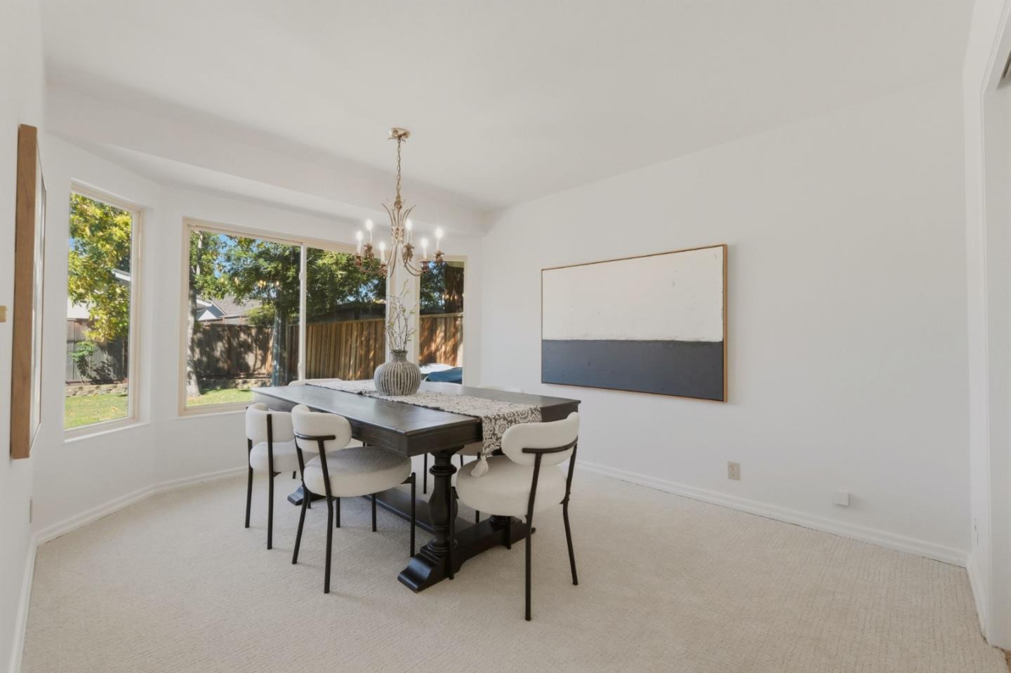 7577 Bollinger Road Cupertino, CA 95014 - Photo 22 of 56 a view of a dining room with furniture window and outside view