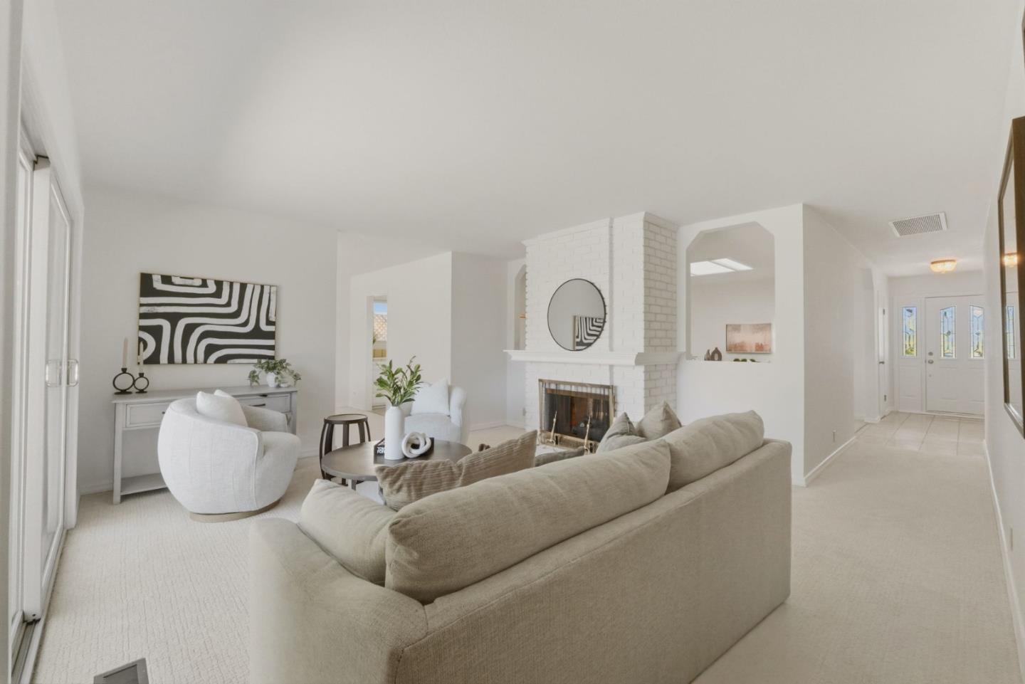 7577 Bollinger Road Cupertino, CA 95014 - Photo 29 of 56 a living room with furniture and a fireplace