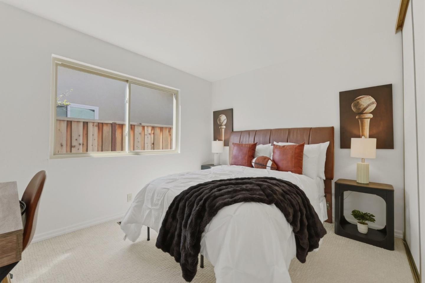 7577 Bollinger Road Cupertino, CA 95014 - Photo 33 of 56 a bedroom with a bed and wooden floor