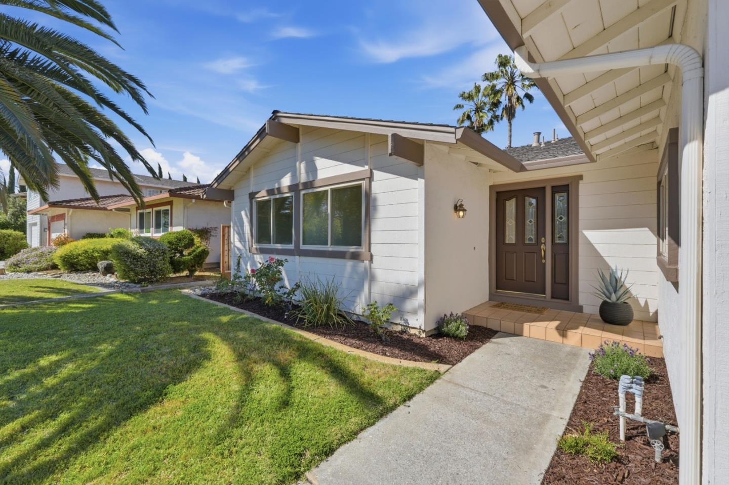 7577 Bollinger Road Cupertino, CA 95014 - Photo 4 of 56 a front view of house with yard