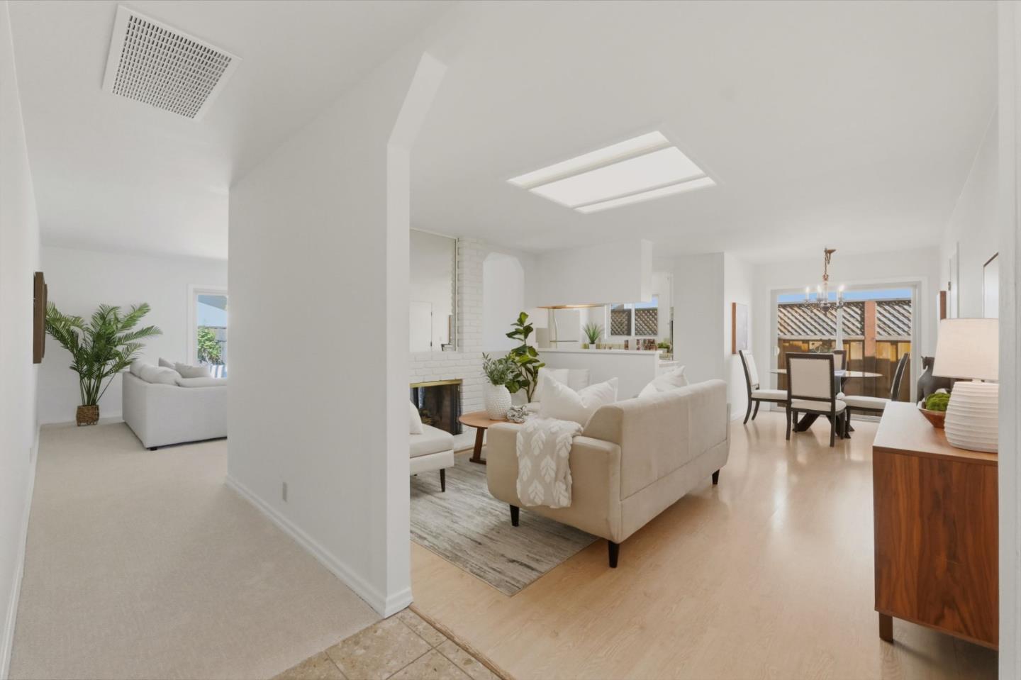 7577 Bollinger Road Cupertino, CA 95014 - Photo 6 of 56 a living room with furniture and a table