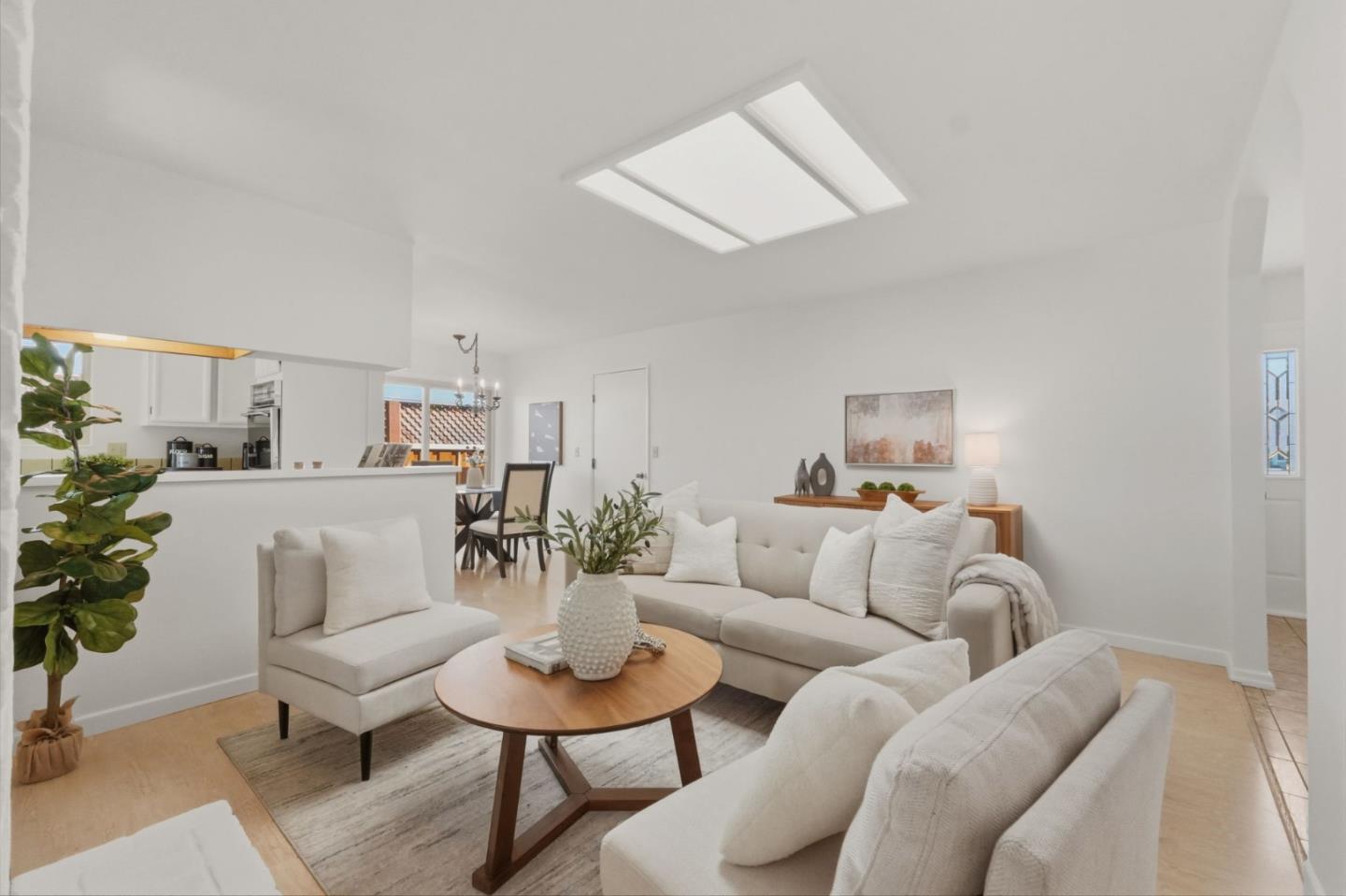 7577 Bollinger Road Cupertino, CA 95014 - Photo 8 of 56 a living room with furniture and a potted plant