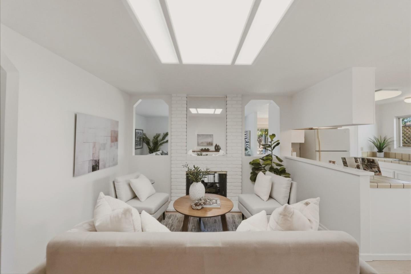 7577 Bollinger Road Cupertino, CA 95014 - Photo 10 of 56 a living room with furniture and a large mirror
