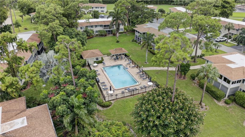 219 Memory Lane, Unit 3 Naples, FL 34112 - Photo 15 of 35 Bird's eye view of the section pool area, just a short distance away