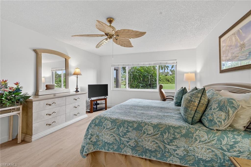 219 Memory Lane, Unit 3 Naples, FL 34112 - Photo 23 of 35 Master bedroom fully furnished