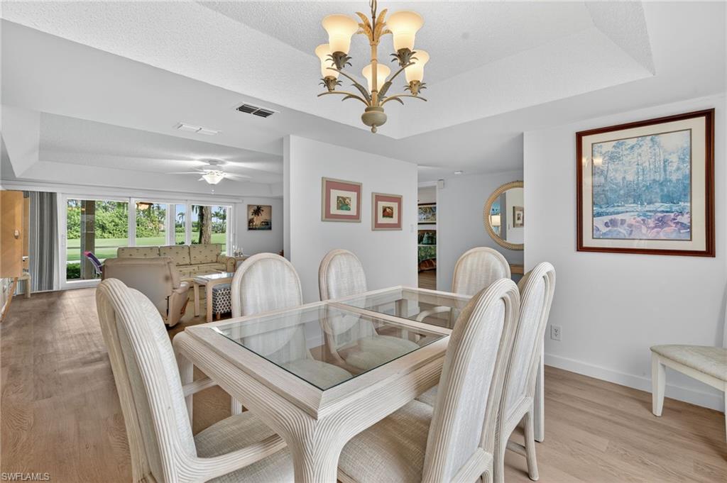 Formal dining room with tray ceiling