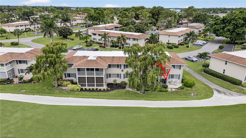 219 Memory Lane, Unit 3 Naples, FL 34112 - Photo 34 of 35 Drone / aerial view of 7th fairway and 219 Memory Ln