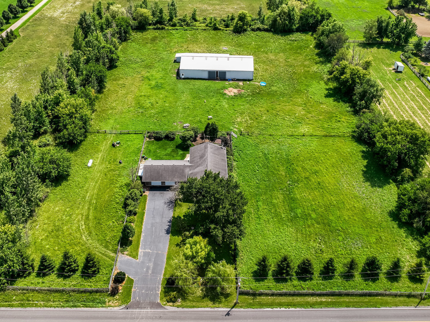 44W601 Ellithorpe Road Elgin, IL 60124 - Photo 1 of 32 a aerial view of a house with a yard