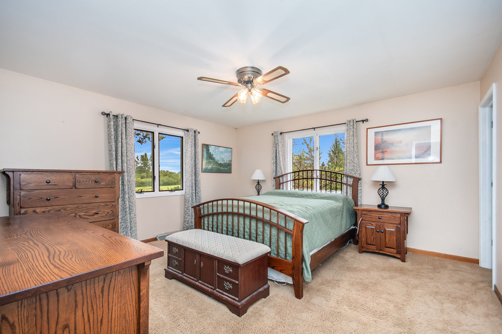 44W601 Ellithorpe Road Elgin, IL 60124 - Photo 19 of 32 a room with a bed and a chandelier