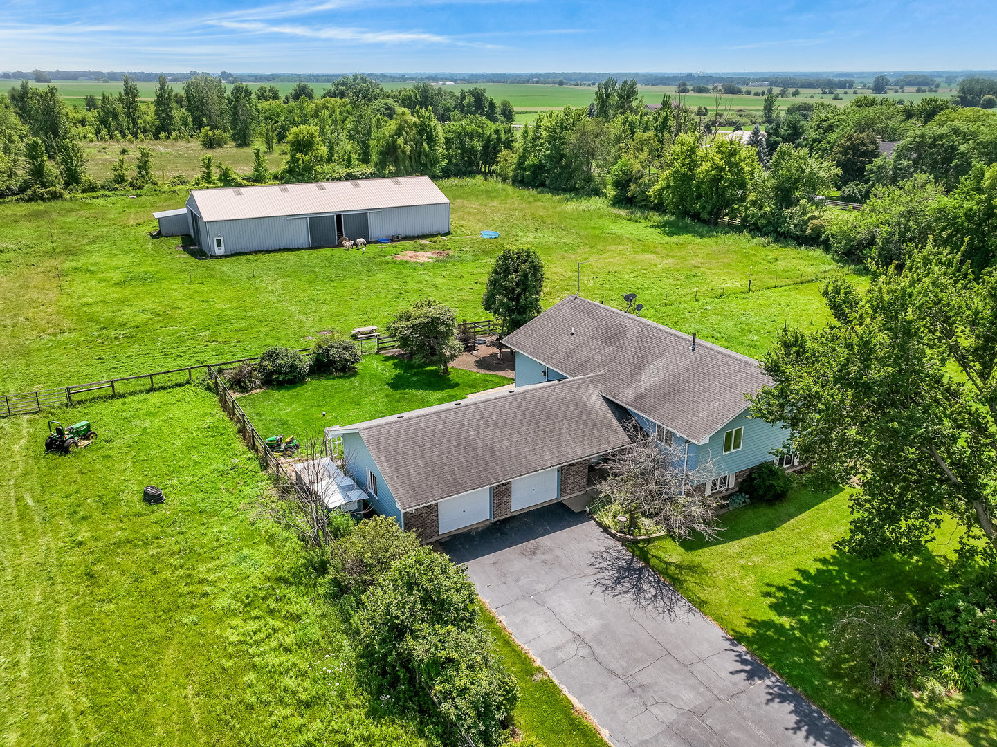 44W601 Ellithorpe Road Elgin, IL 60124 - Photo 2 of 32 a aerial view of a house with garden