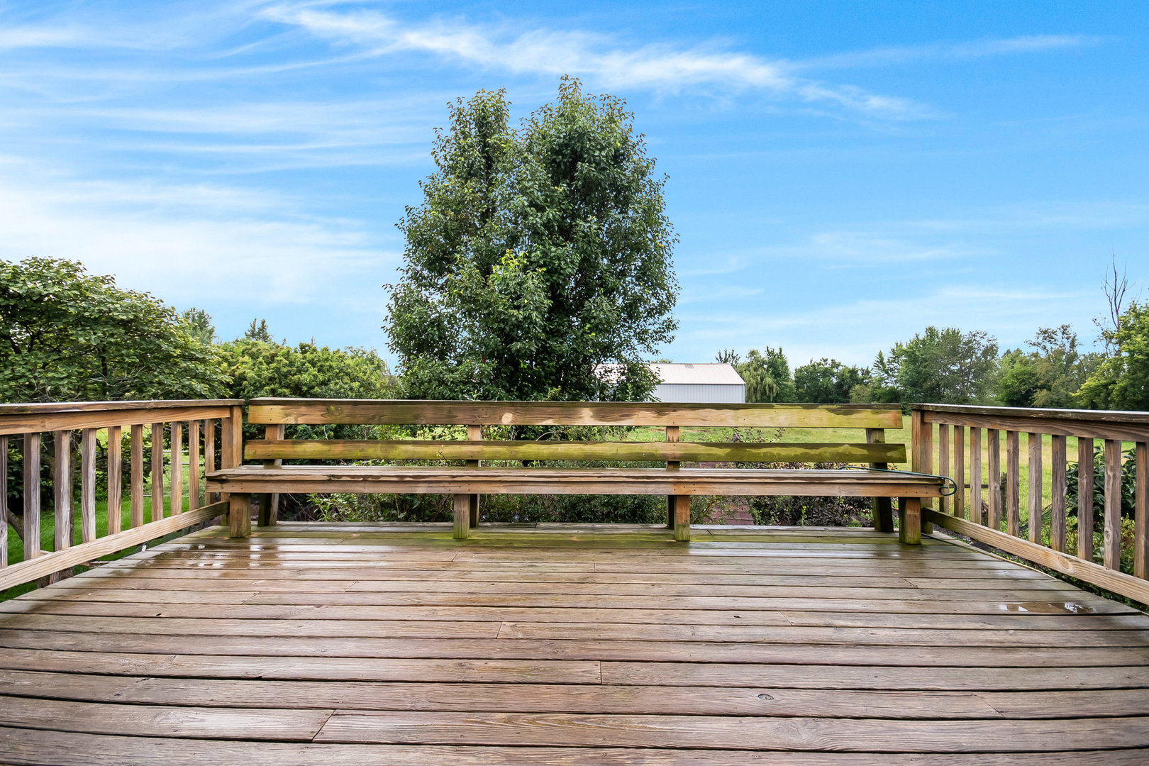 44W601 Ellithorpe Road Elgin, IL 60124 - Photo 27 of 32 a view of a balcony with wooden floor and fence