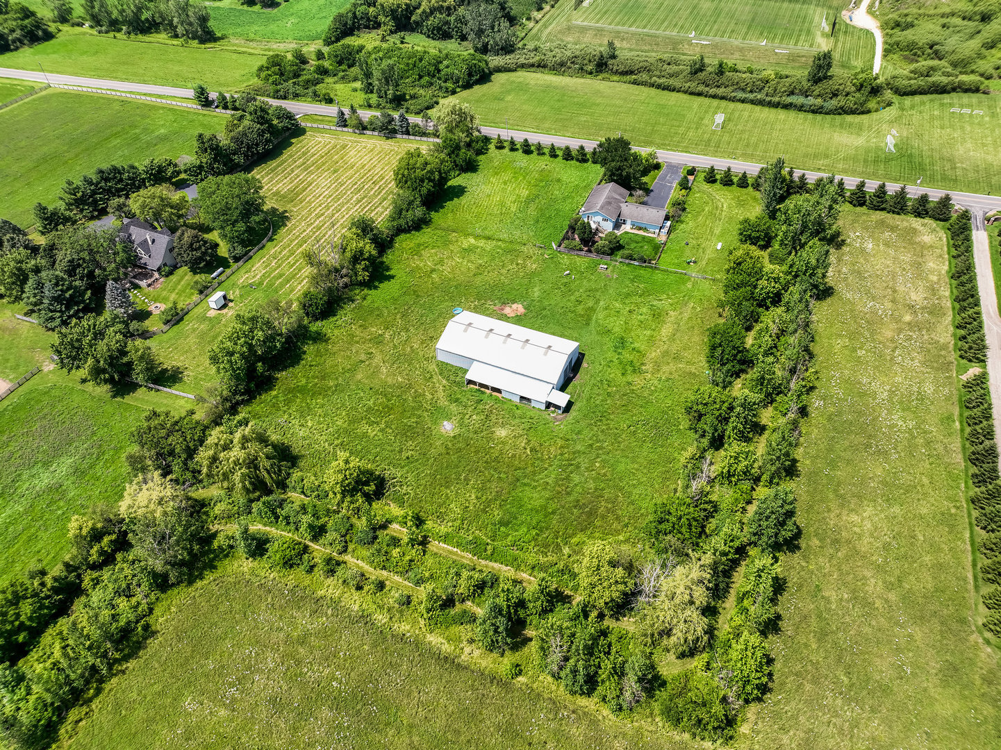 44W601 Ellithorpe Road Elgin, IL 60124 - Photo 29 of 32 an aerial view of a residential houses with outdoor space and trees all around
