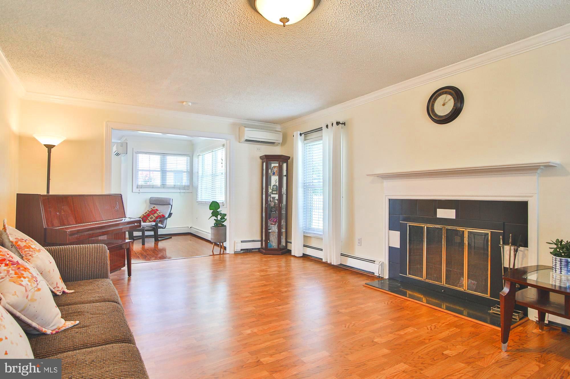 25 Trim Road Levittown, PA 19056 - Photo 4 of 37 Living Room - fireplace fills the room w ambiance