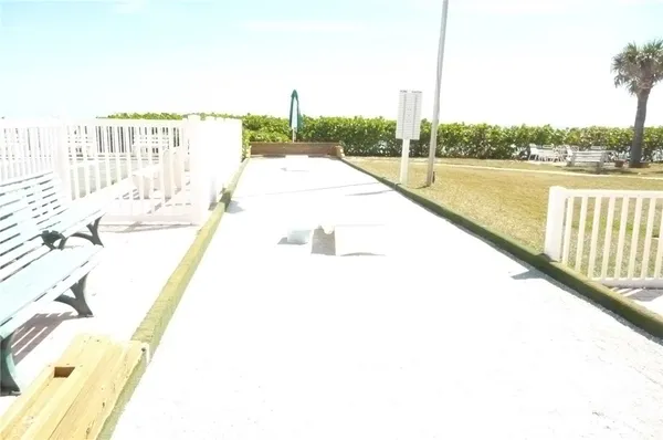 a view of swimming pool from a balcony