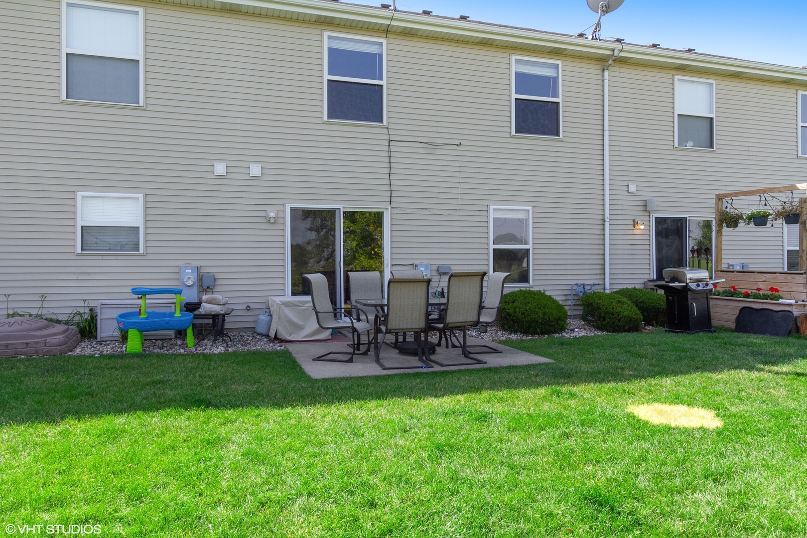 25109 Faraday Road Manhattan, IL 60442 - Photo 12 of 12 a view of a house with backyard and sitting area