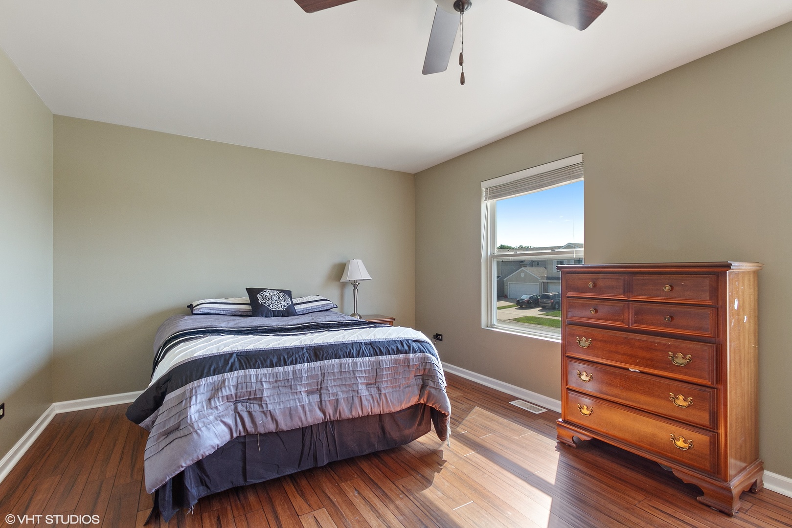25109 Faraday Road Manhattan, IL 60442 - Photo 6 of 12 a bedroom with a bed and a dresser