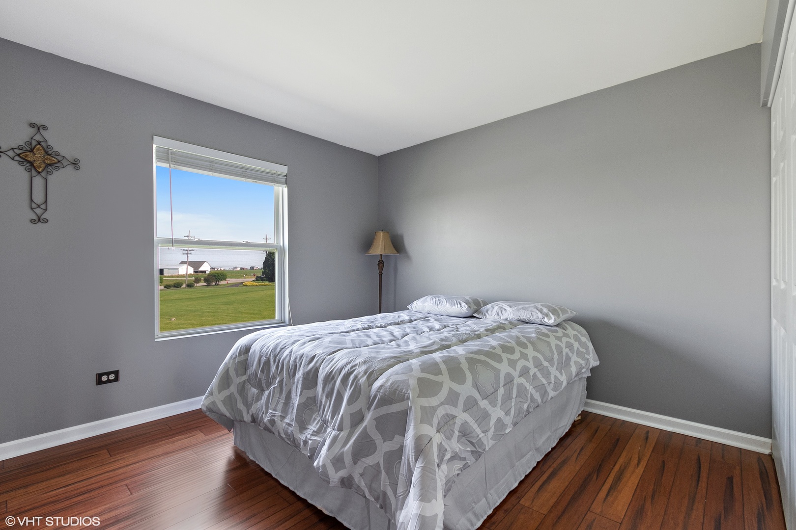 25109 Faraday Road Manhattan, IL 60442 - Photo 7 of 12 a bed sitting in a bedroom next to a window
