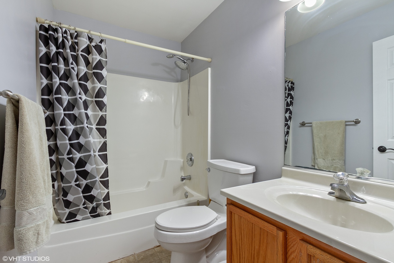 25109 Faraday Road Manhattan, IL 60442 - Photo 9 of 12 a bathroom with a sink and a mirror