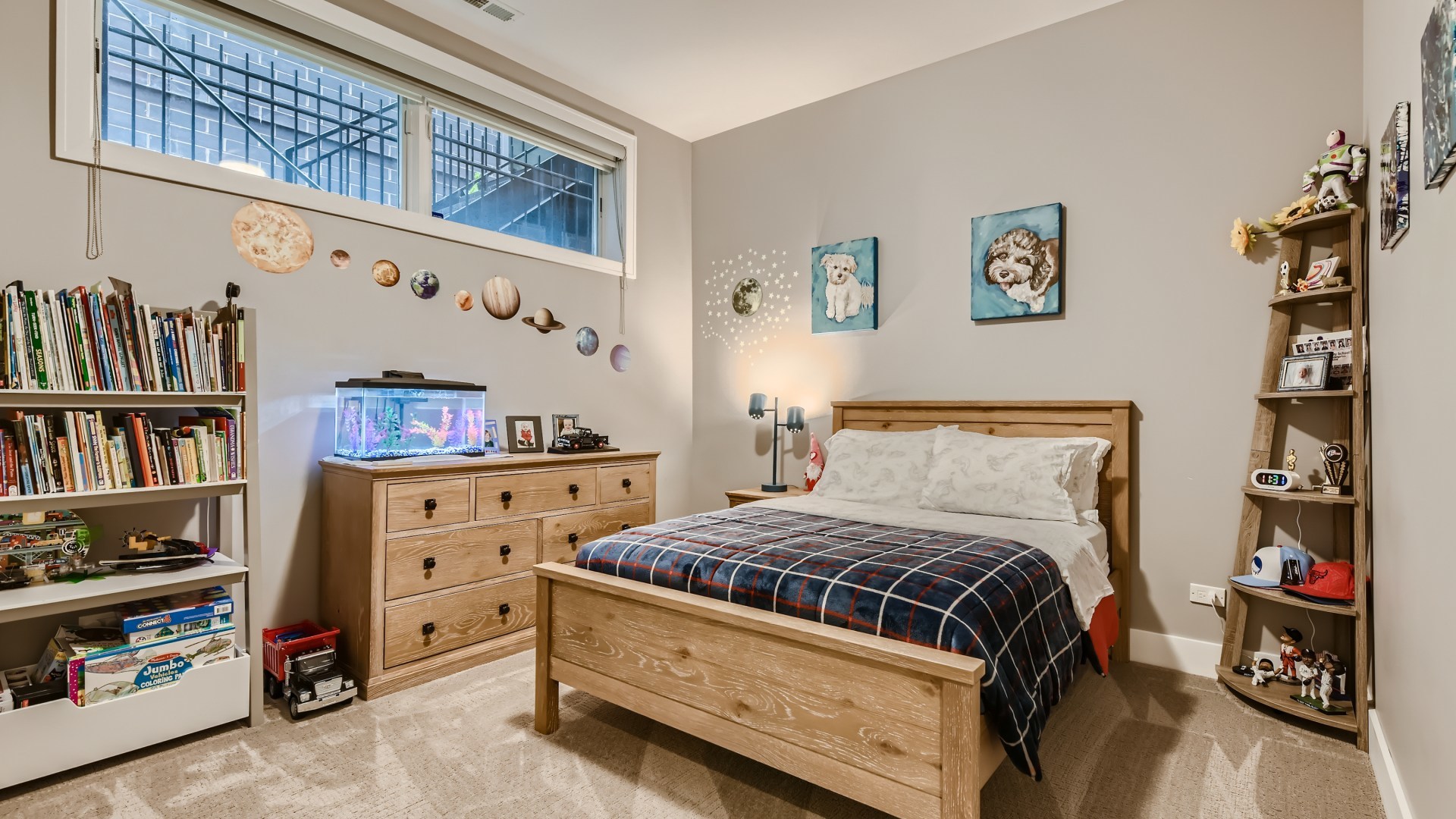 2144 West Rice Street, Unit 1E Chicago, IL 60622 - Photo 12 of 20 a bedroom with a bed and a book shelf