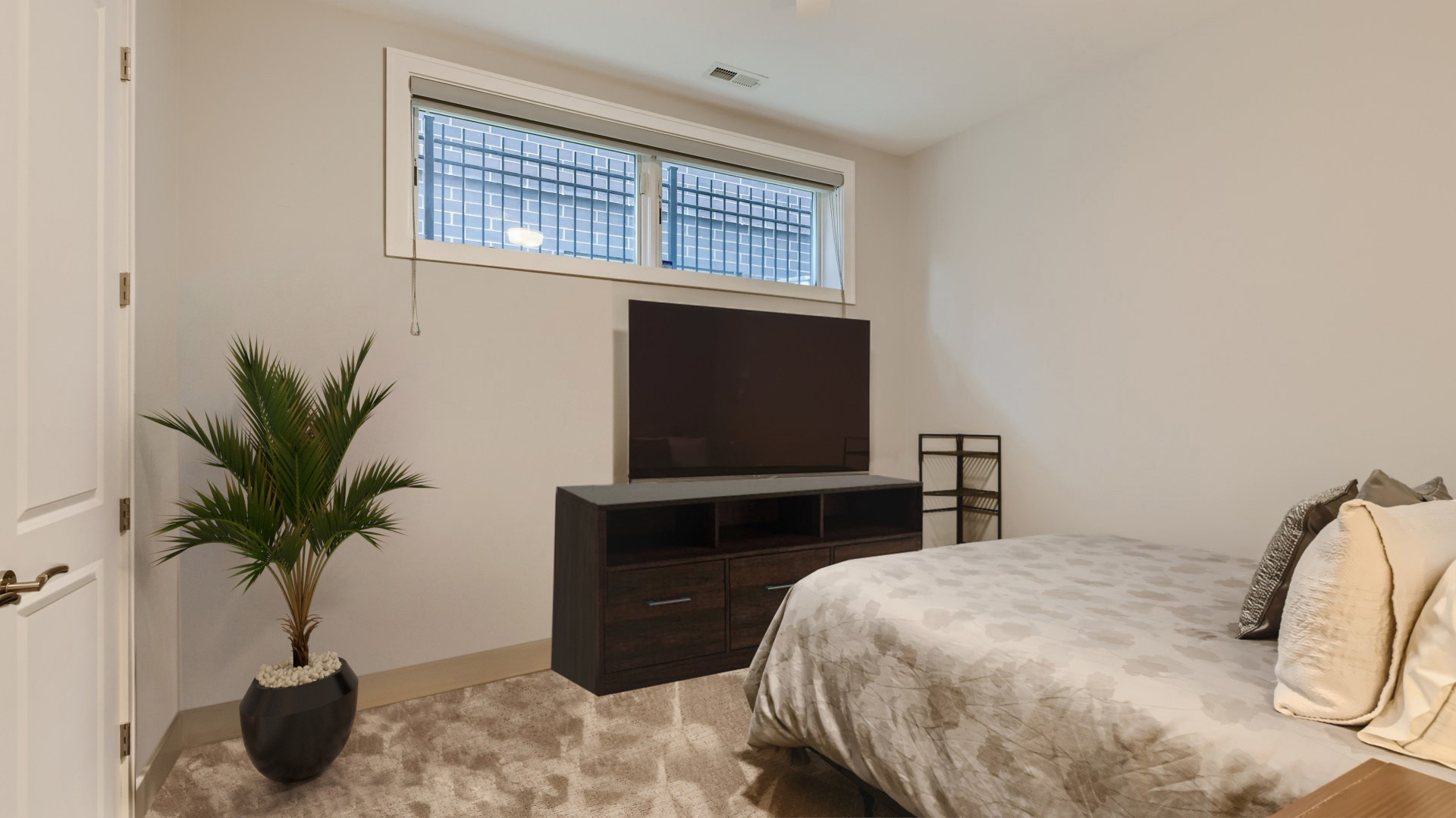 2144 West Rice Street, Unit 1E Chicago, IL 60622 - Photo 14 of 20 a bedroom with a bed and a potted plant
