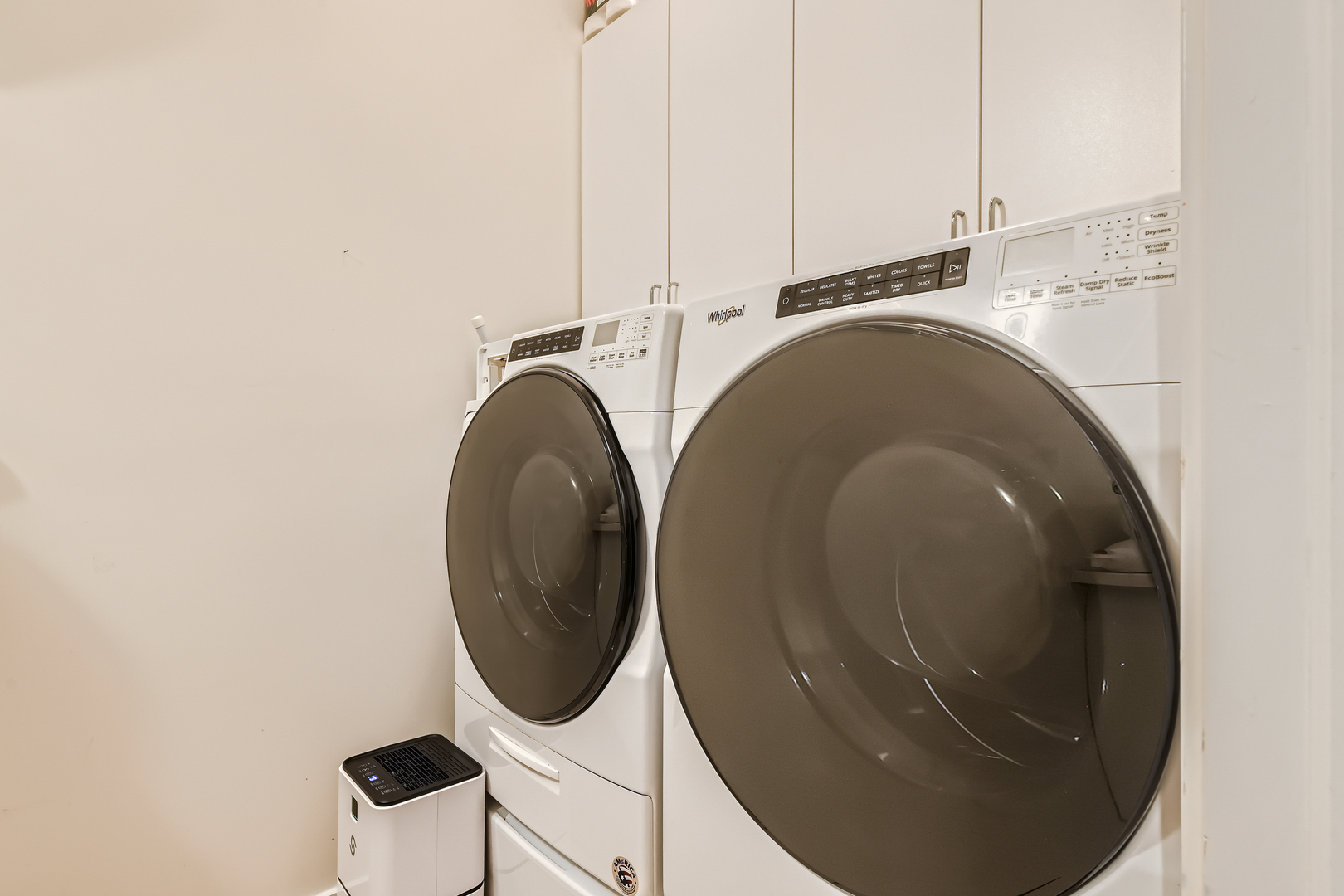 2144 West Rice Street, Unit 1E Chicago, IL 60622 - Photo 18 of 20 a utility room with dryer and washer