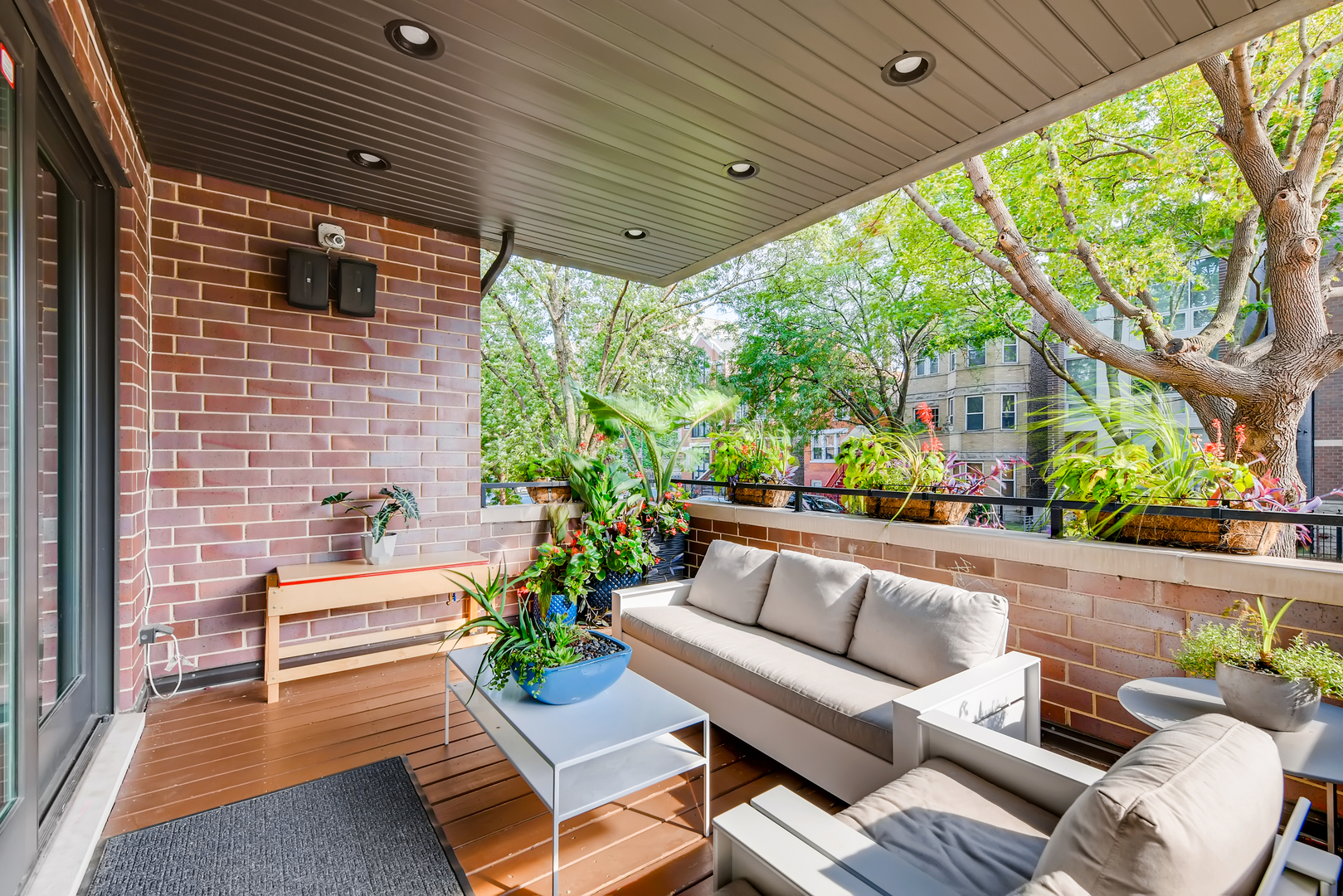 2144 West Rice Street, Unit 1E Chicago, IL 60622 - Photo 3 of 20 a outdoor living space with furniture and a potted plant