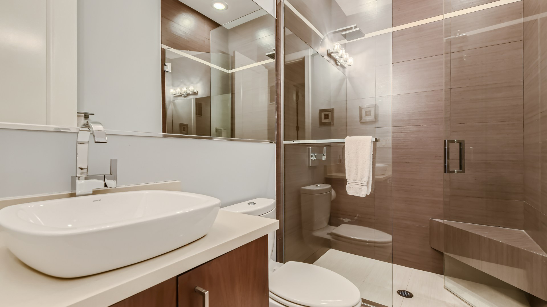 2144 West Rice Street, Unit 1E Chicago, IL 60622 - Photo 10 of 20 a bathroom with a sink a toilet and shower