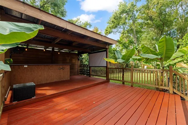 a view of a patio with a table and chairs