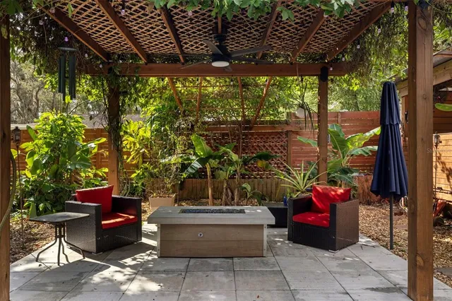 a yellow bench sitting in front of a building