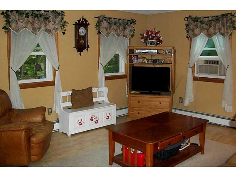 170 Libby Road Casco, ME 04015 - Photo 16 of 30 Living Room. Lots of windows