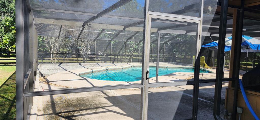 1804 East Wheeler Road Seffner, FL 33584 - Photo 10 of 25 a view of swimming pool with outdoor seating