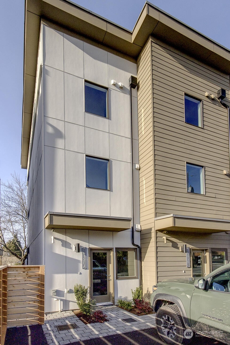 10170 Holman Road Northwest, Unit A Seattle, WA 98133 - Photo 1 of 13 a view of a house with a street