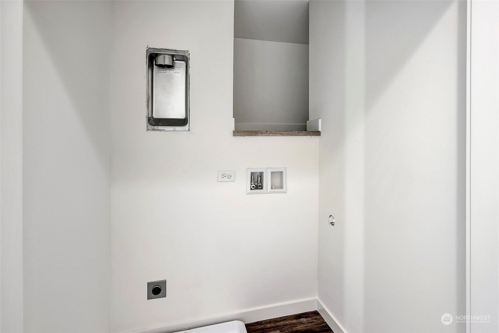 10170 Holman Road Northwest, Unit A Seattle, WA 98133 - Photo 12 of 13 a bathroom with a sink and mirror