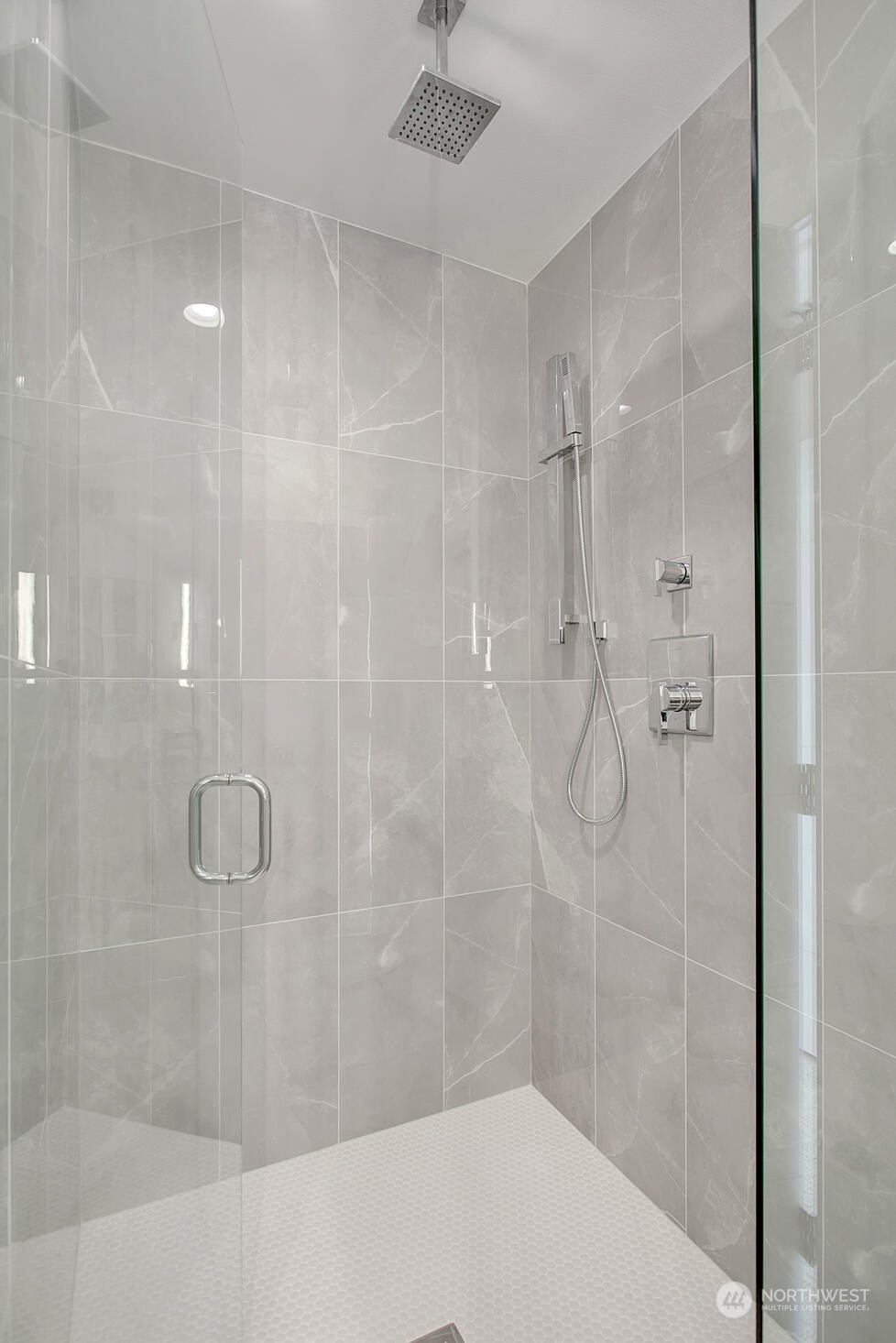 10170 Holman Road Northwest, Unit A Seattle, WA 98133 - Photo 8 of 13 a bathroom with a shower