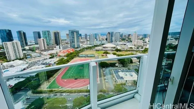 a view of swimming pool with seating space