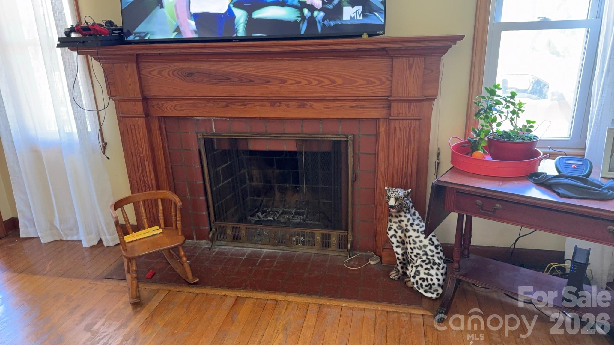 1582 Dutch Cove Road Canton, NC 28716 - Photo 13 of 47 a living room with furniture and a fireplace