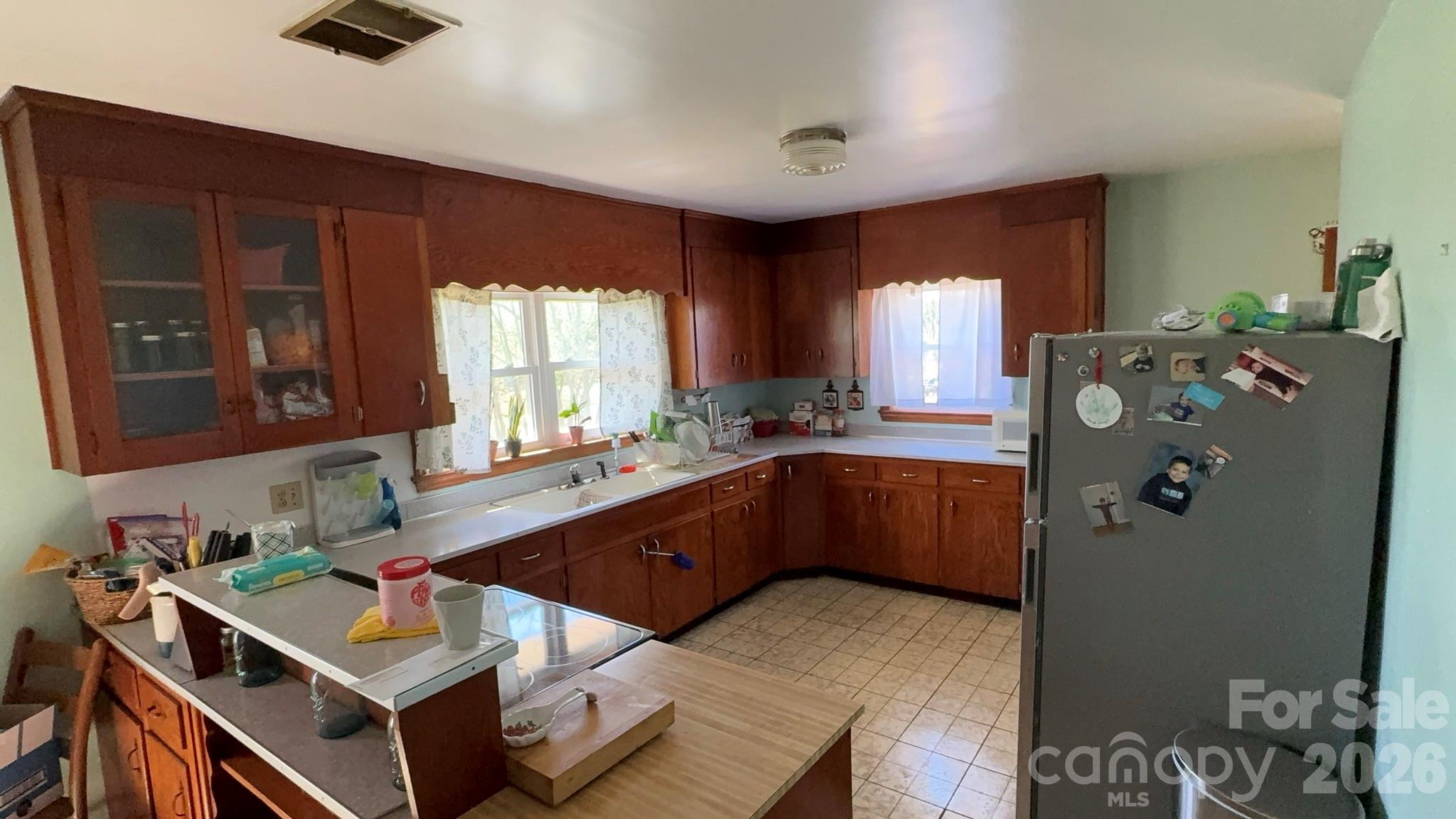 1582 Dutch Cove Road Canton, NC 28716 - Photo 18 of 47 a kitchen with a refrigerator and a stove