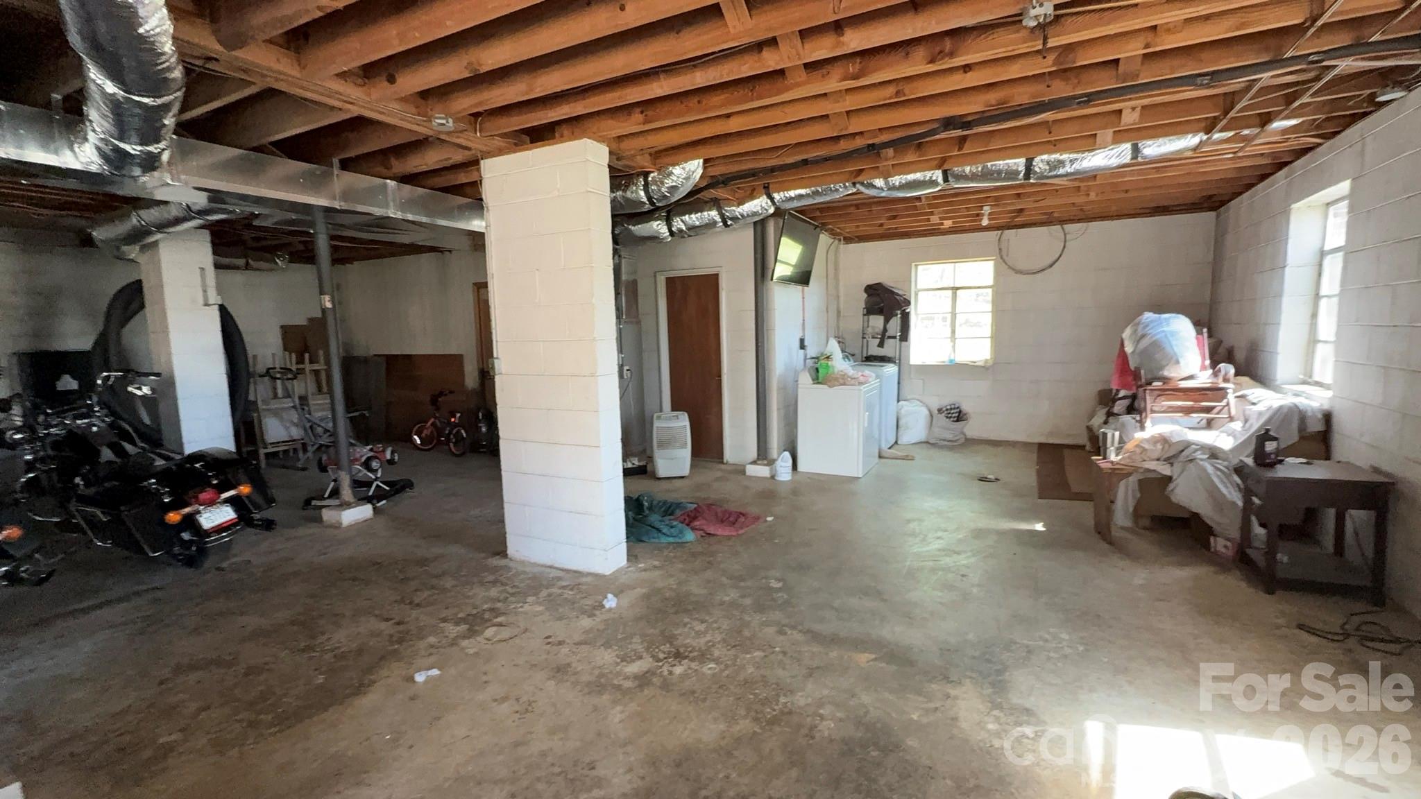1582 Dutch Cove Road Canton, NC 28716 - Photo 38 of 47 a view of a room with gym equipment