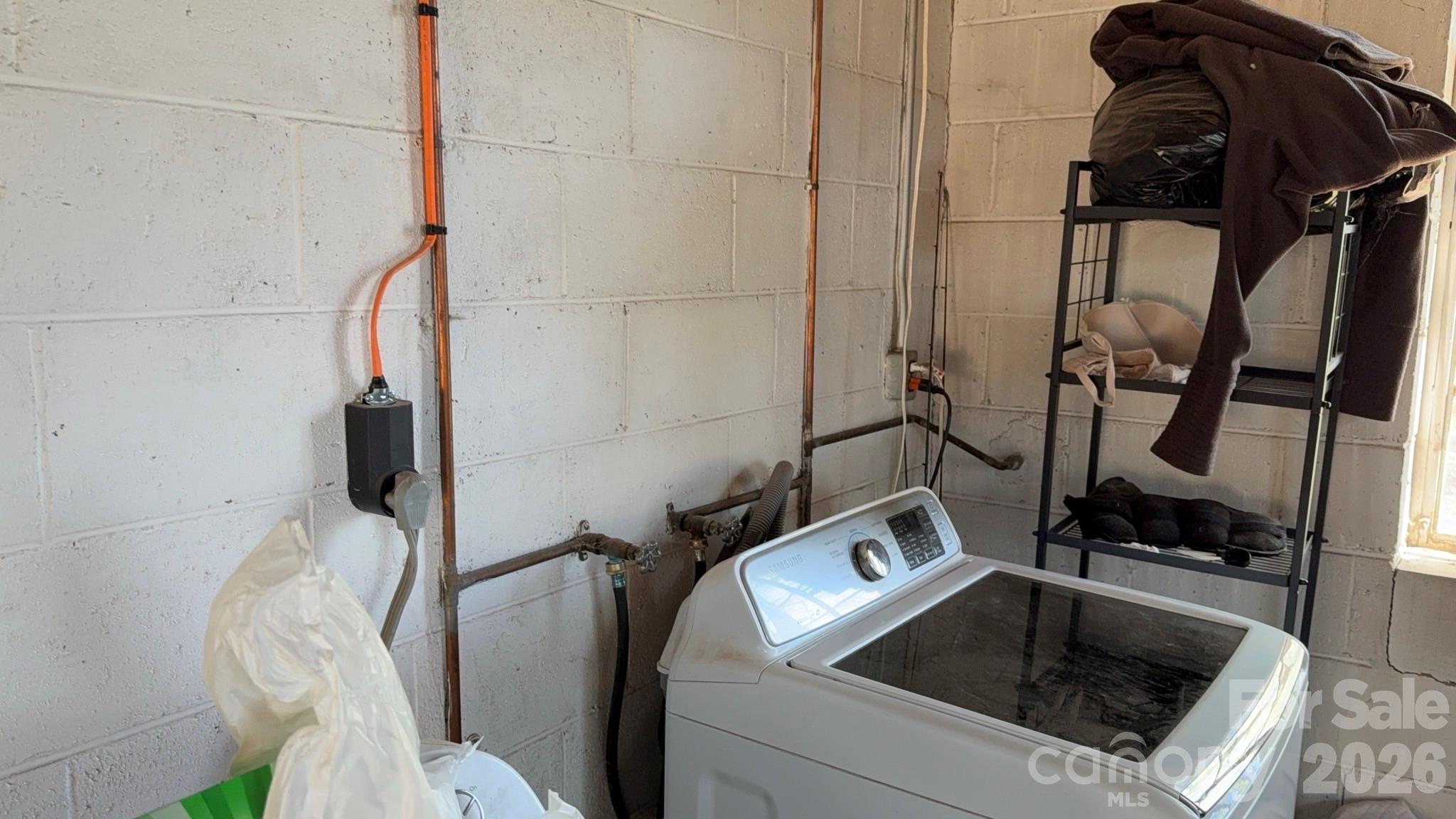 1582 Dutch Cove Road Canton, NC 28716 - Photo 39 of 47 a utility room with dryer and washer