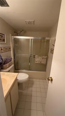 a table that has a table and chairs in it