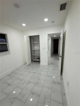 a utility room with closet