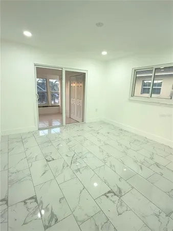 a view of an empty room and window