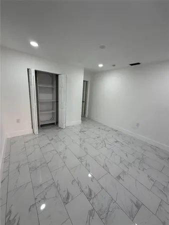 a view of a livingroom with furniture