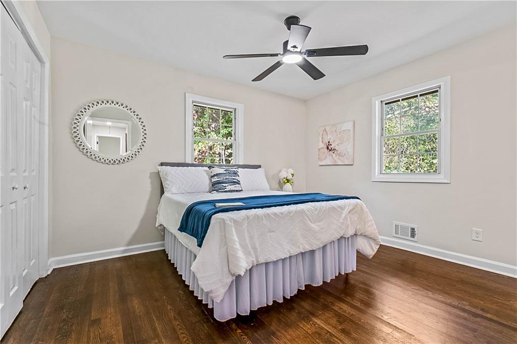 1576 South Gordon Road Southwest Austell, GA 30168 - Photo 17 of 33 a bedroom with a bed and a window