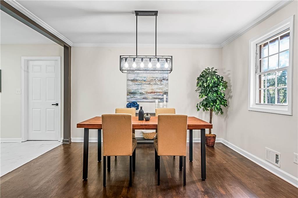 1576 South Gordon Road Southwest Austell, GA 30168 - Photo 23 of 33 a view of a dining room with furniture window and wooden floor