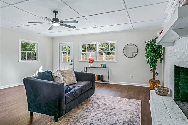 a living room with furniture and a window