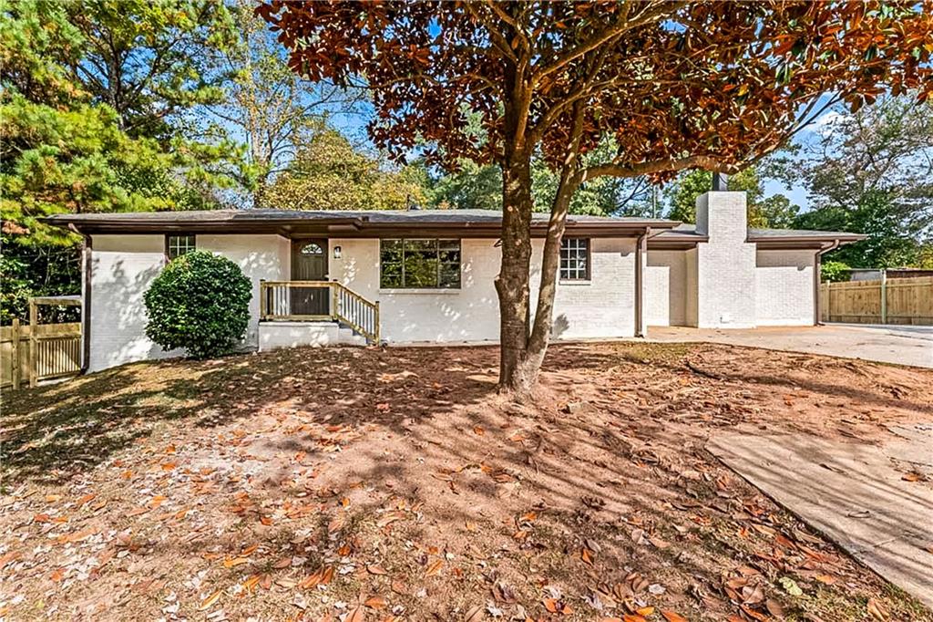 1576 South Gordon Road Southwest Austell, GA 30168 - Photo 6 of 33 front view of a house with a large tree